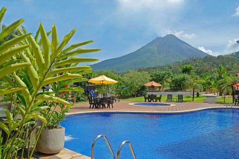 Pool and volcano view of Volcano Lodge and Springs