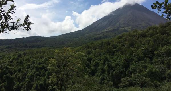 Arenal Volcano Tour Image: Arenal Volcano through the forest of El Silencio Mirador.
