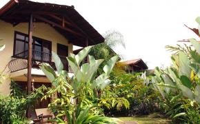 Hot Springs Hotels Image: Balcony views and lush landscaping, via Casa Luna Hotel and Spa.