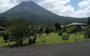 Hot Springs Hotels Image: Arenal Volcano looms in the background of Hotel Sueño Dorado.